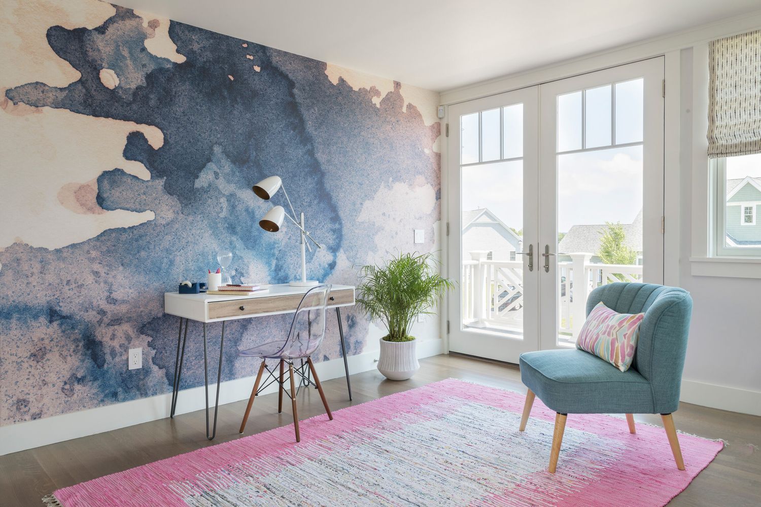 a colorful rug in a home office