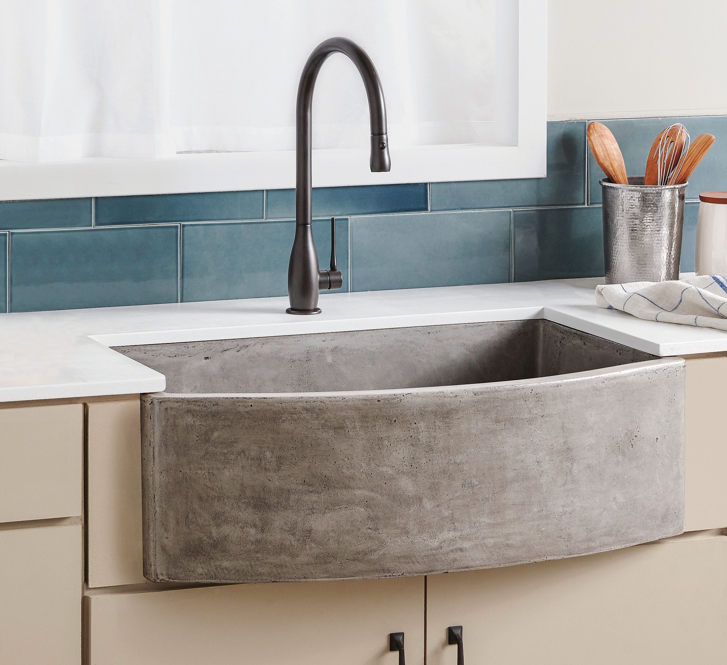 a concrete farmhouse sink