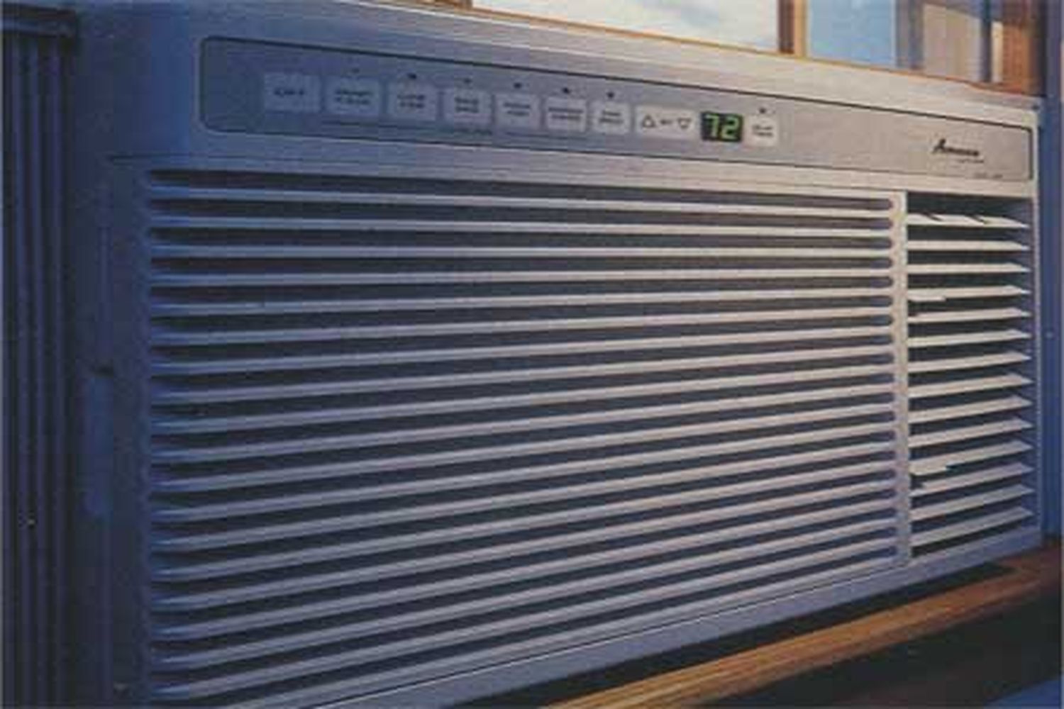 An air conditioner unit installed in a window.