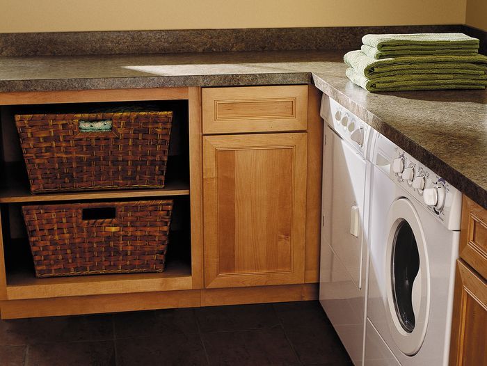 A laundry room with laminate countertops.
