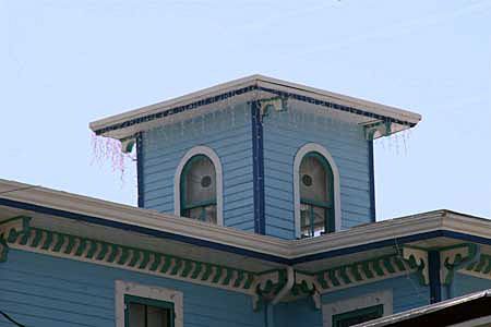 A flat cupola on top of a building.