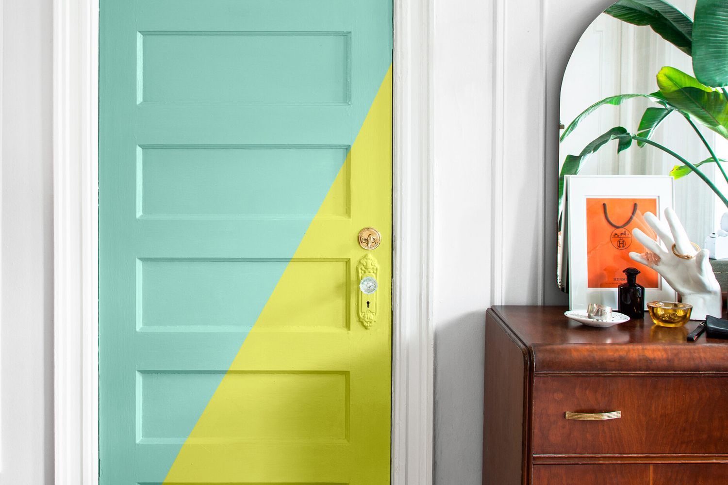 Colorful two tone accent door painted teal blue and lime green.