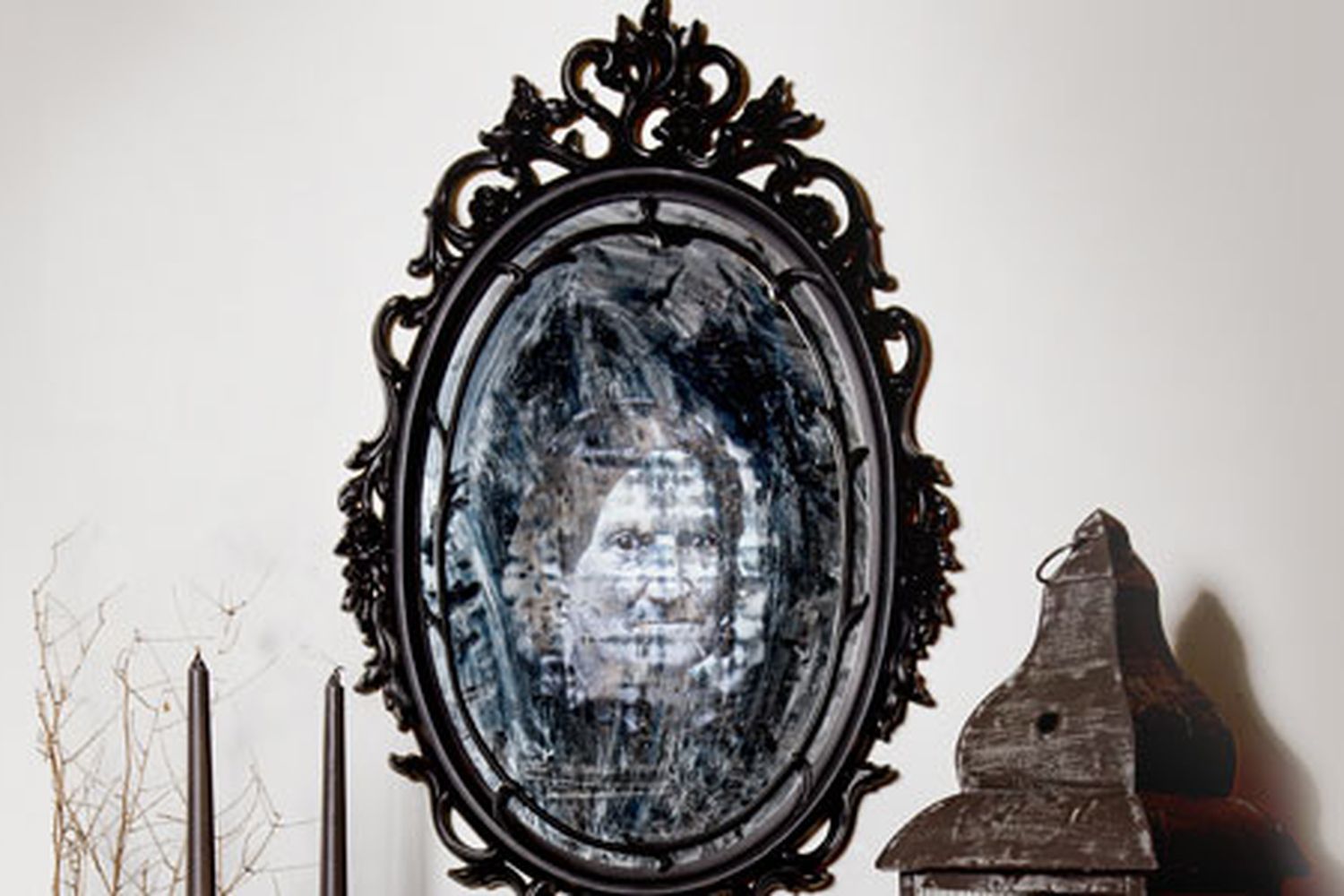 Image of a DIY eerie haunted mirror that adds a ghostly presence to any Halloween decor