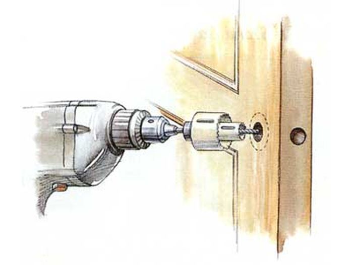 A drill being used to enlarge a hole.