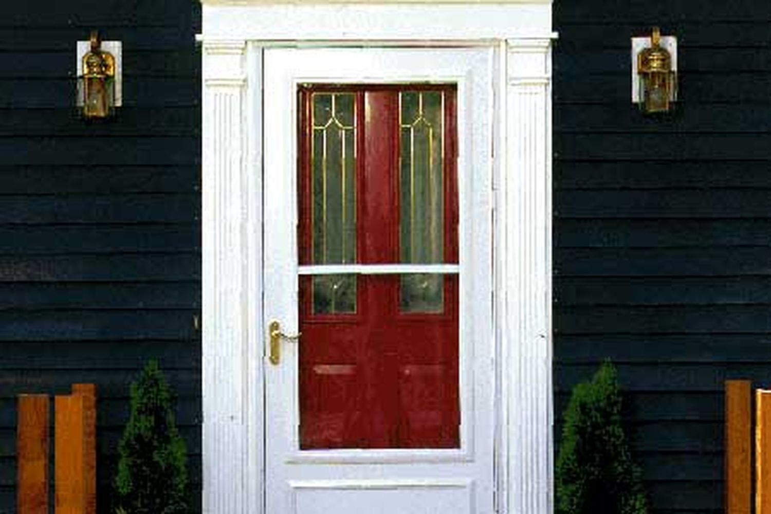a newly installed door and storm door onto an entryway