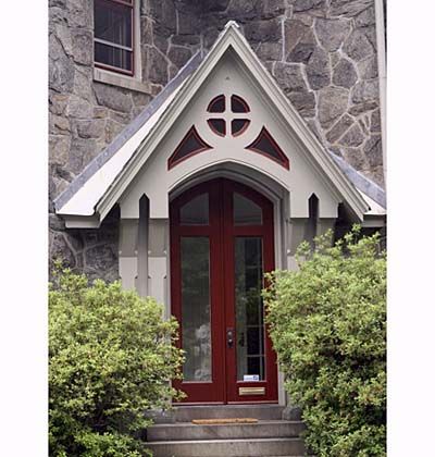 A building with a stone gray exterior.