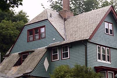 A well made home with blue and brown paint.