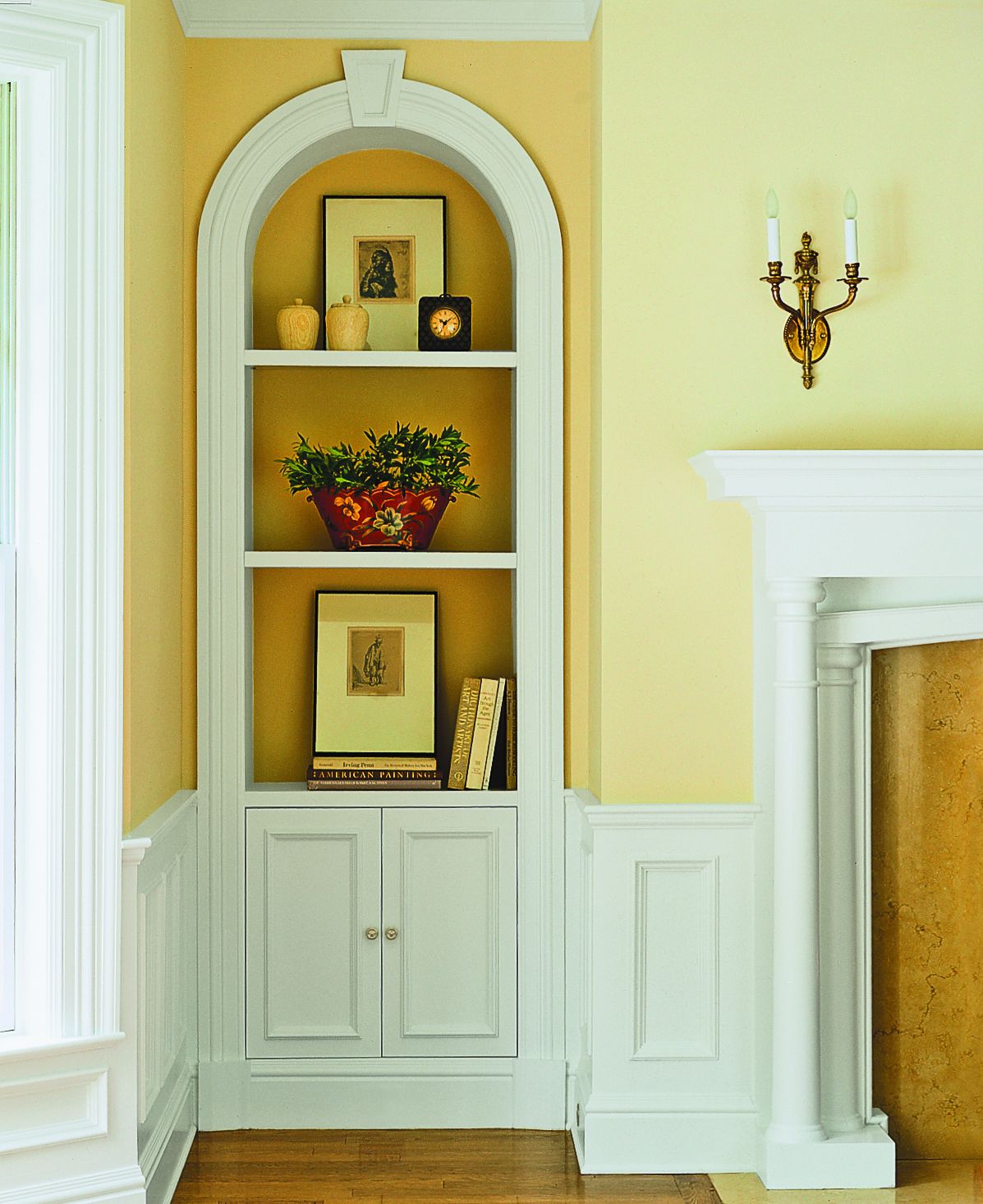 A set of shelves and cabinets for storage.