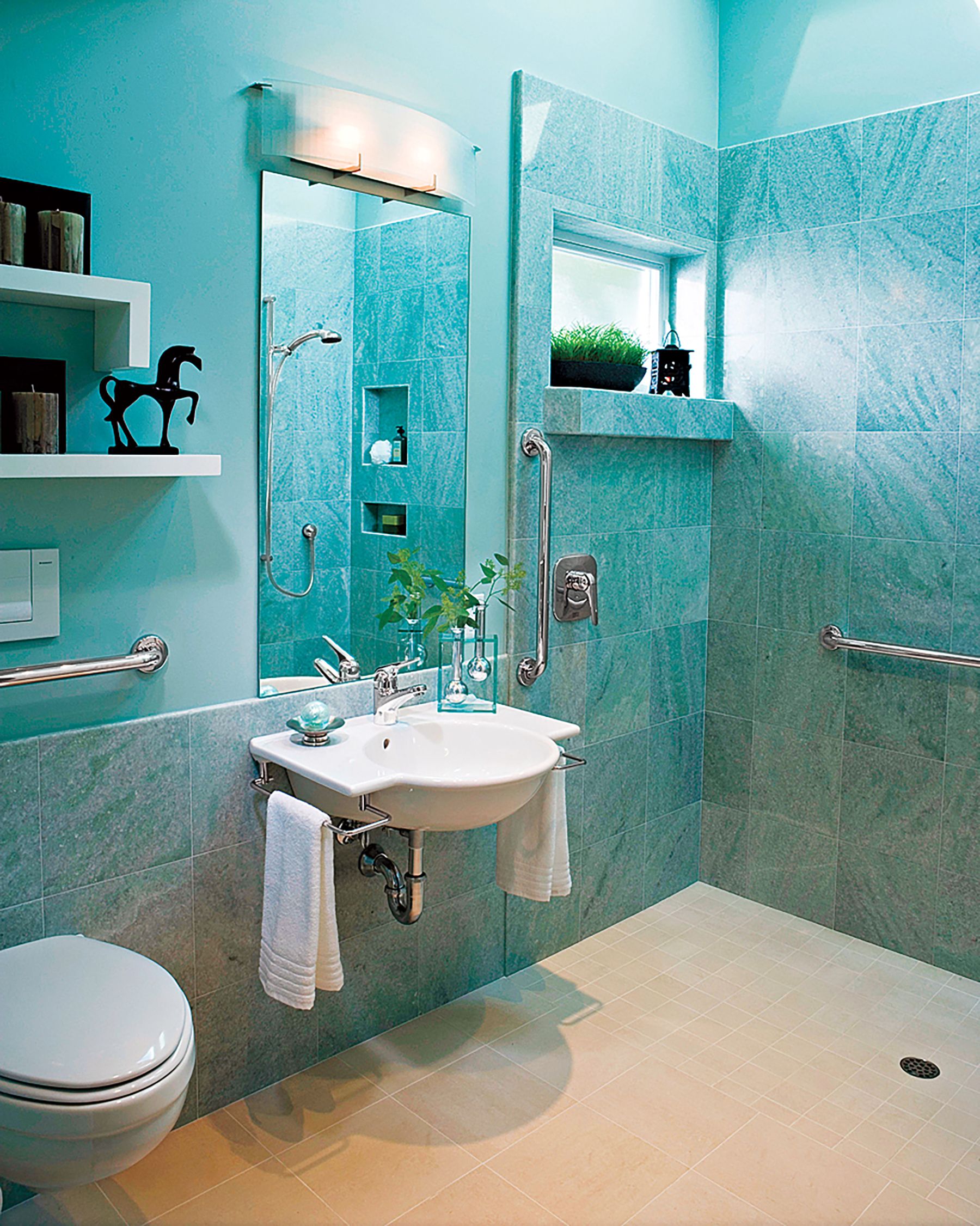 A bathroom with natural light coming from a shower window.