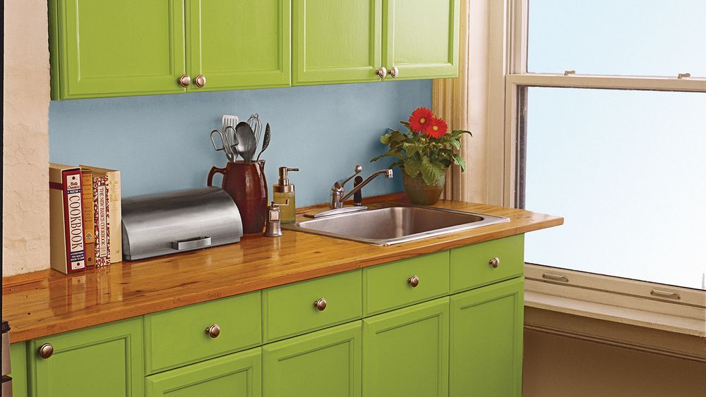 Green kitchen cabinets.