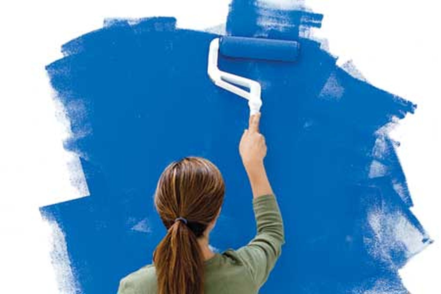 A woman uses a roller brush to paint blue exterior paint.