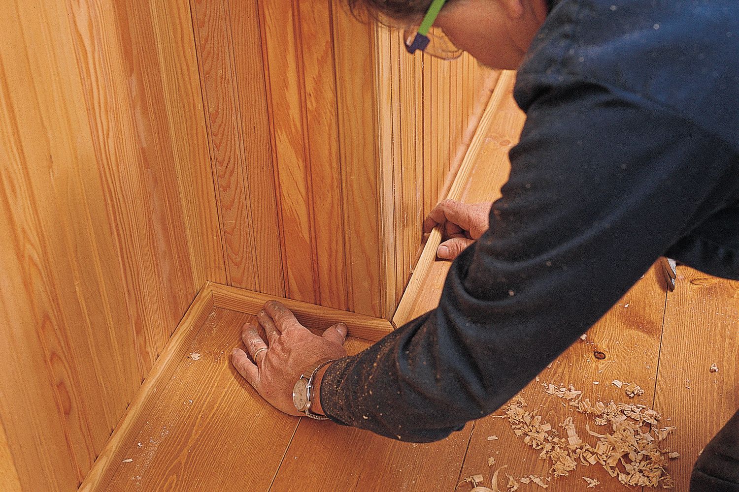 image of Tom Silva demonstrating how to install beadboard wainscoting