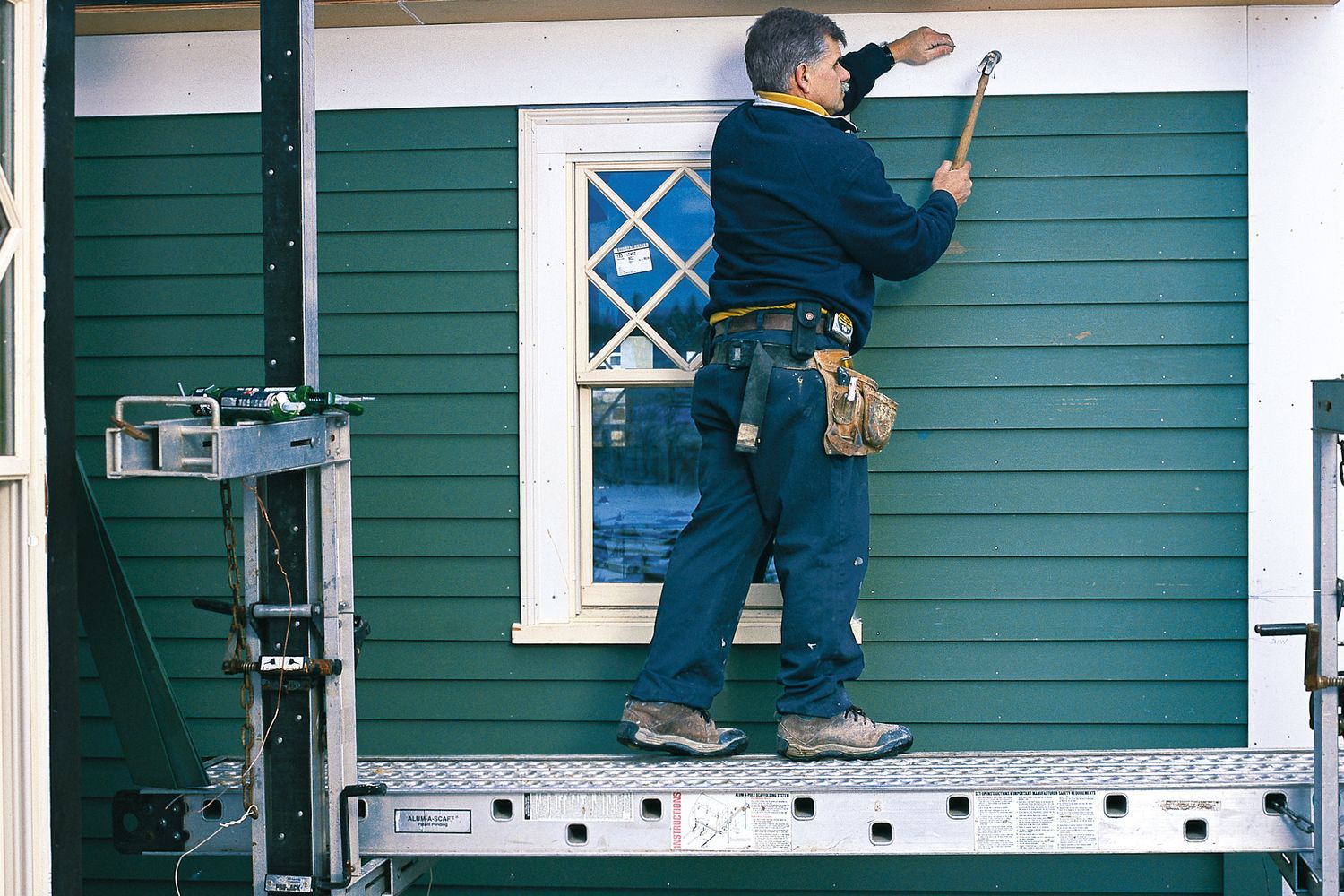 Hanging clapboard siding