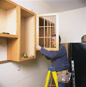 How to Hang Kitchen Cabinets - This Old House