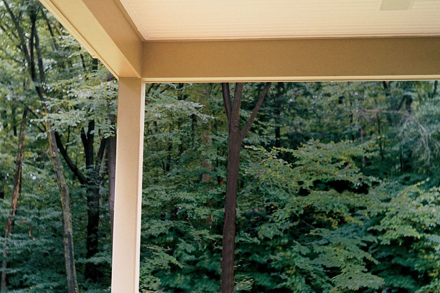 A porch with a beadboard ceiling.
