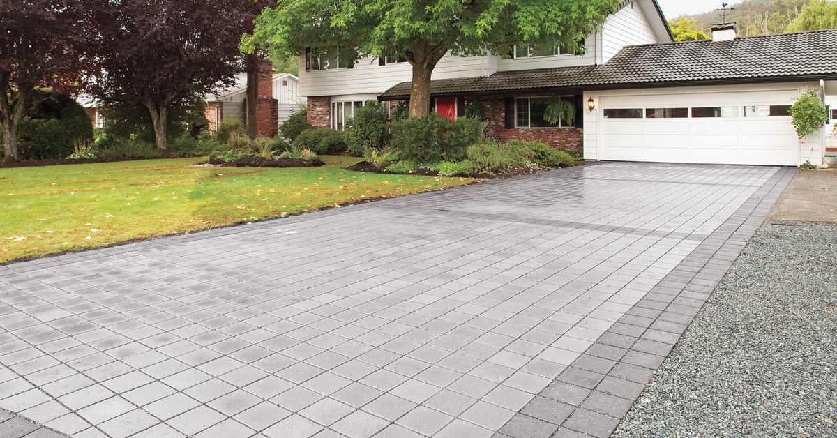 Permeable paver driveway allows rain water to soak through.