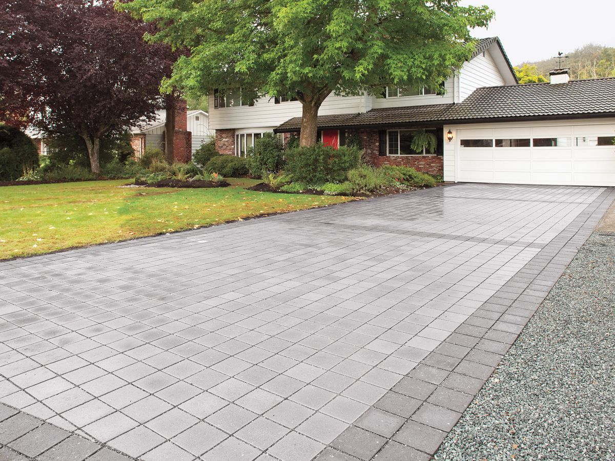 Permeable paver driveway allows rain water to soak through.