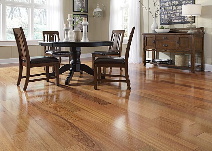 Prefinished wood flooring with a shiny top coat.