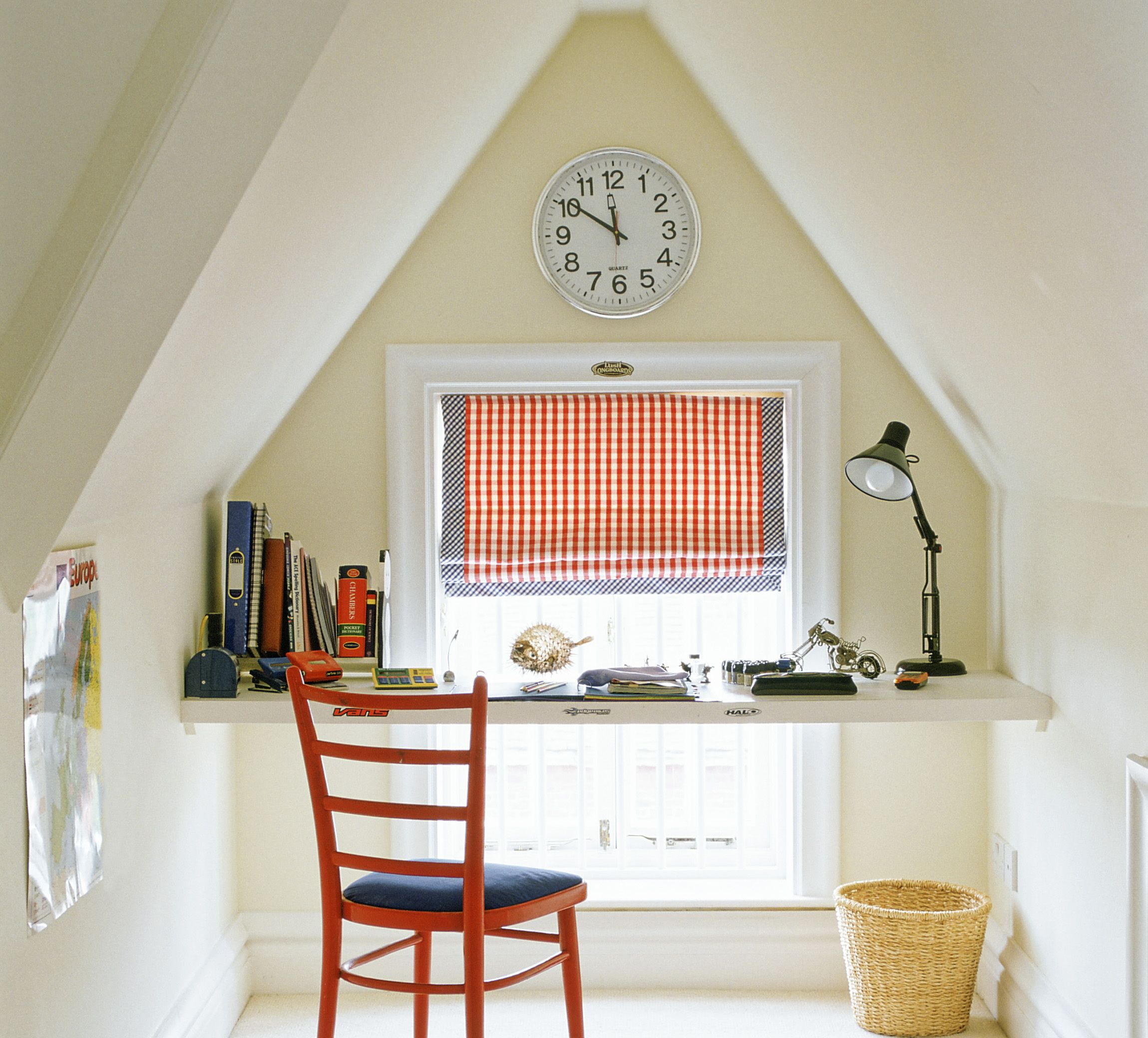 a dormer desk in a cottage-style interior