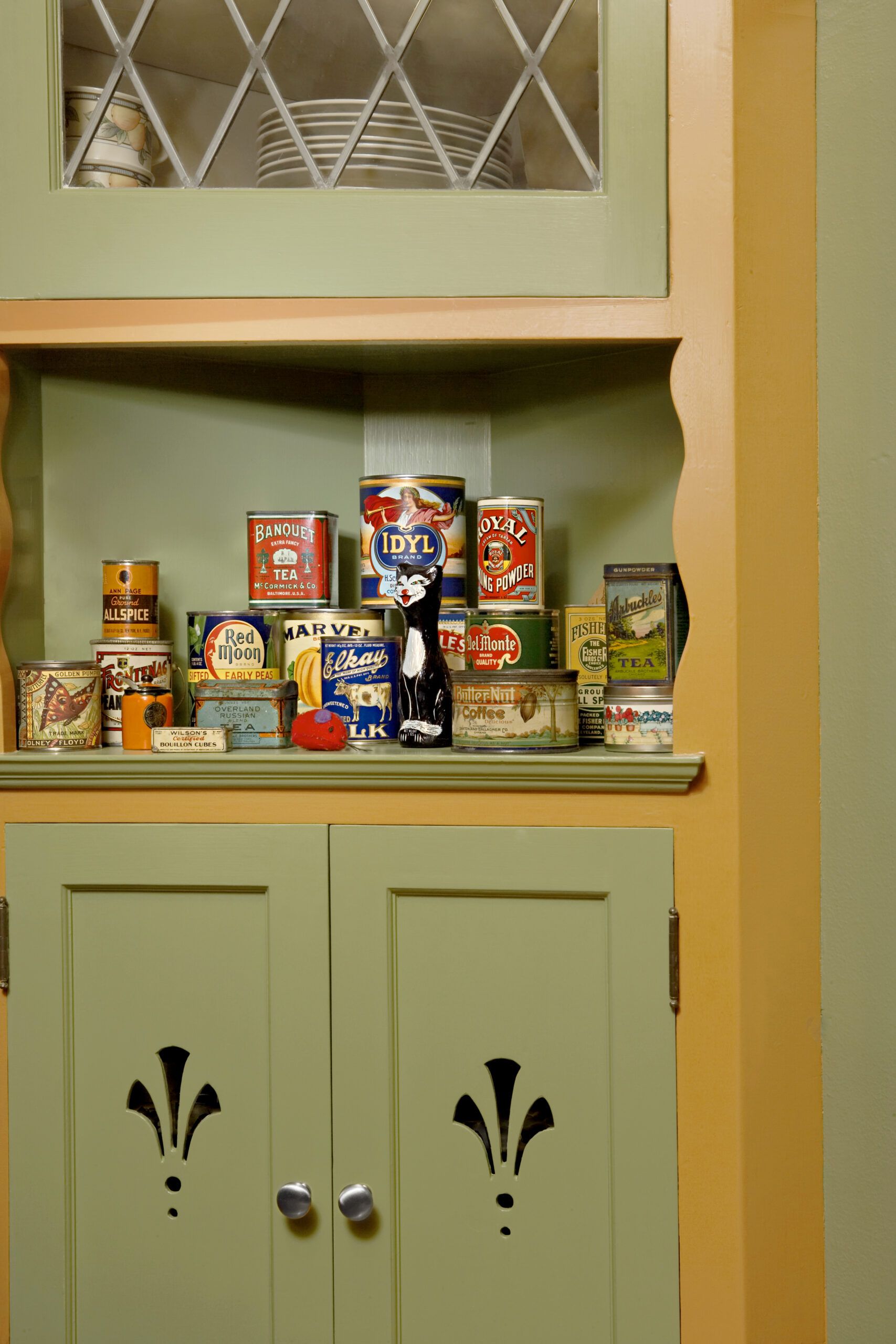 Kitchen cabinets with door cutouts.