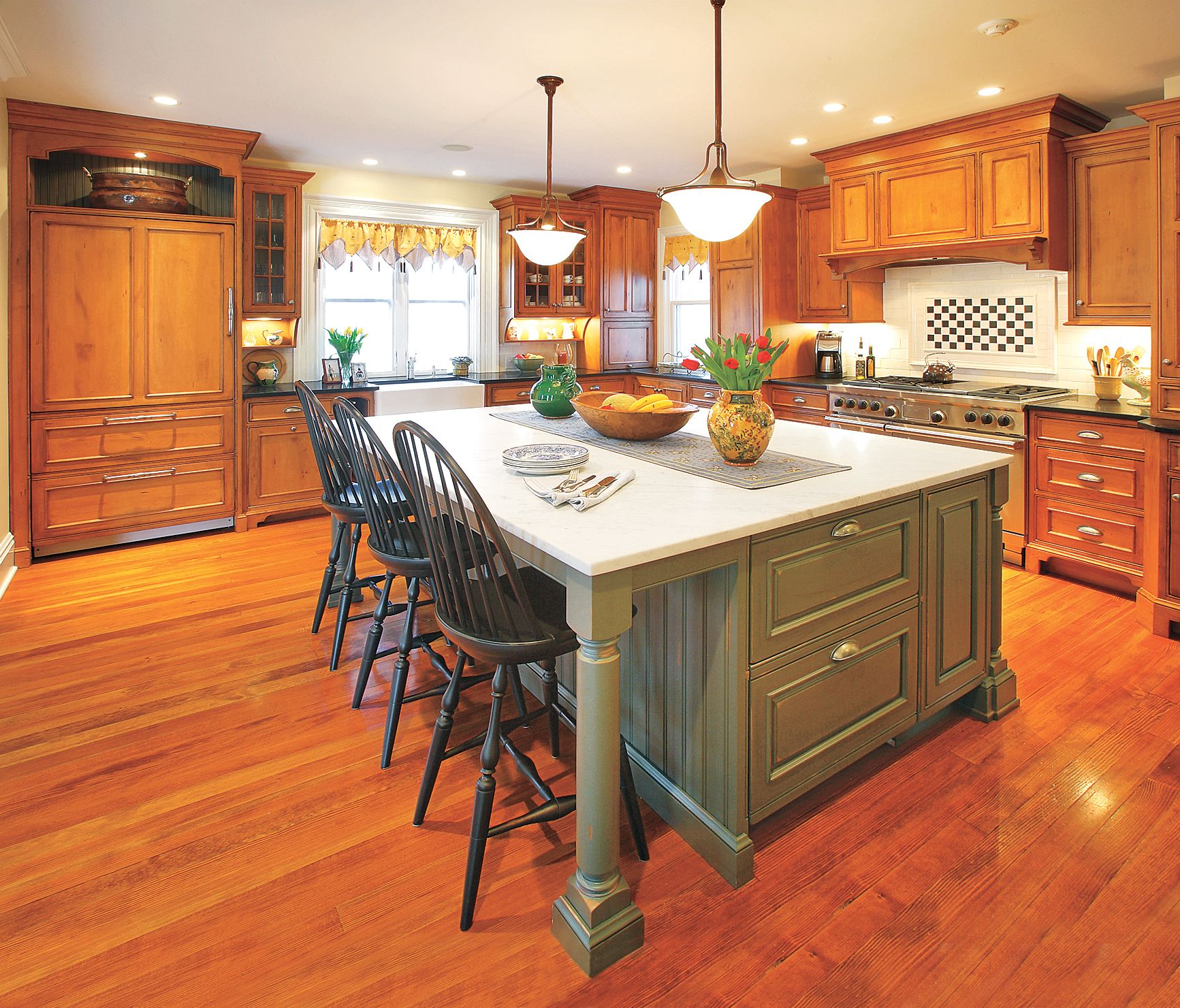 A kitchen island with built in cabinets.