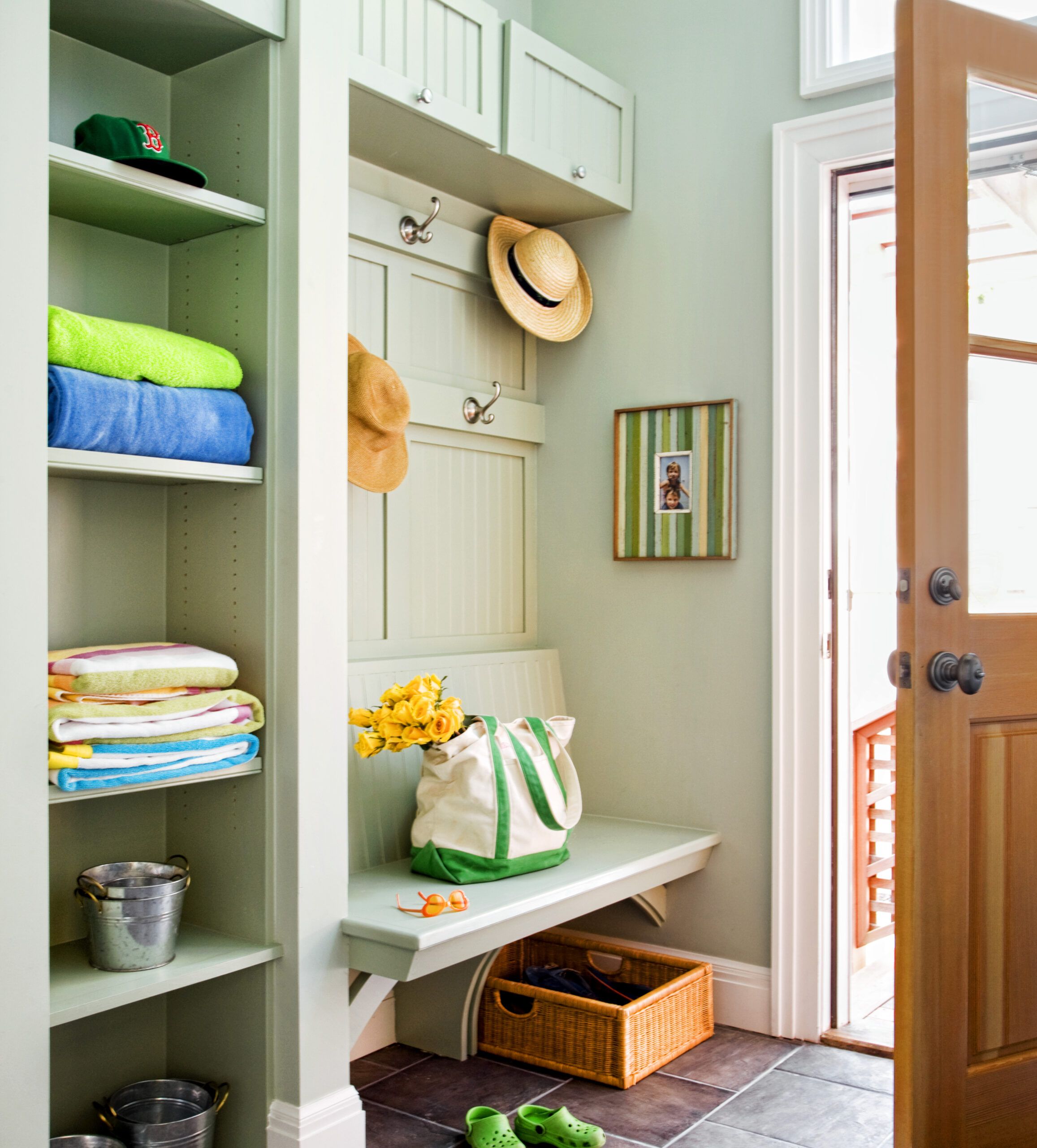 a mini mudroom in a cottage-style interior of a home