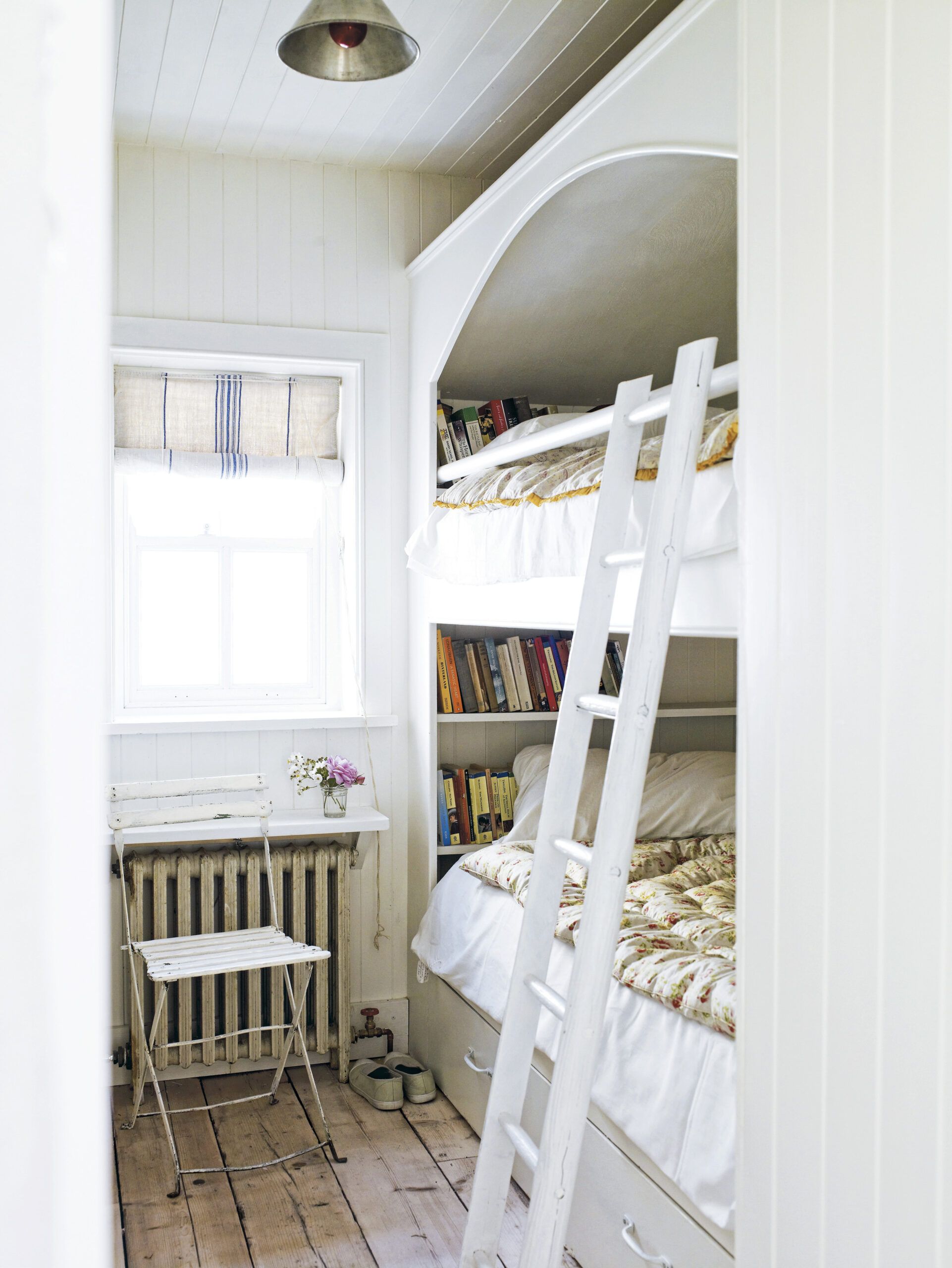 bunk beds in a cottage-style interior of a home