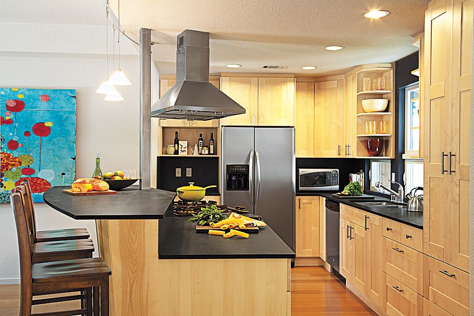 A kitchen island with a stove on top of it.