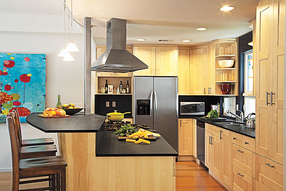 A kitchen island with a stove on top of it.