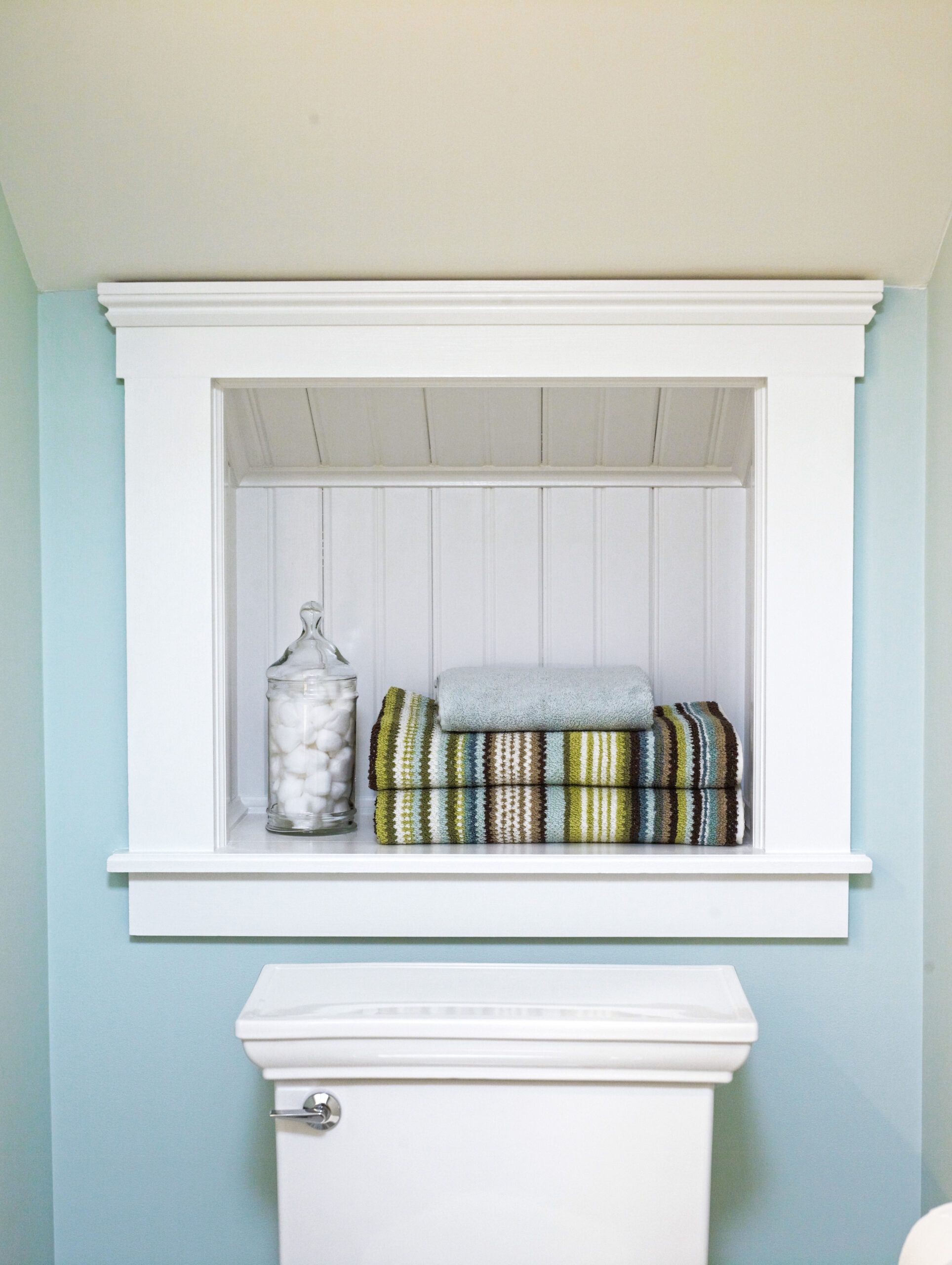 a storage niche in a cottage-style interior of a home