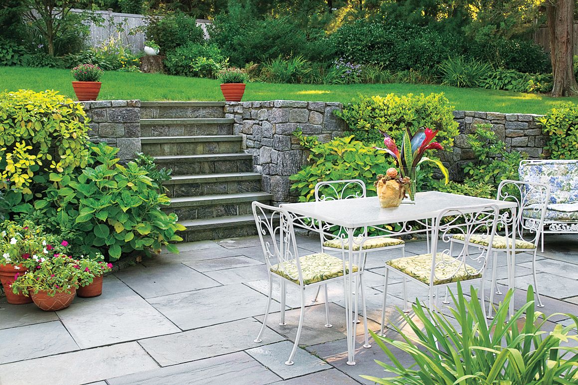 A patio made of cut bluestone.