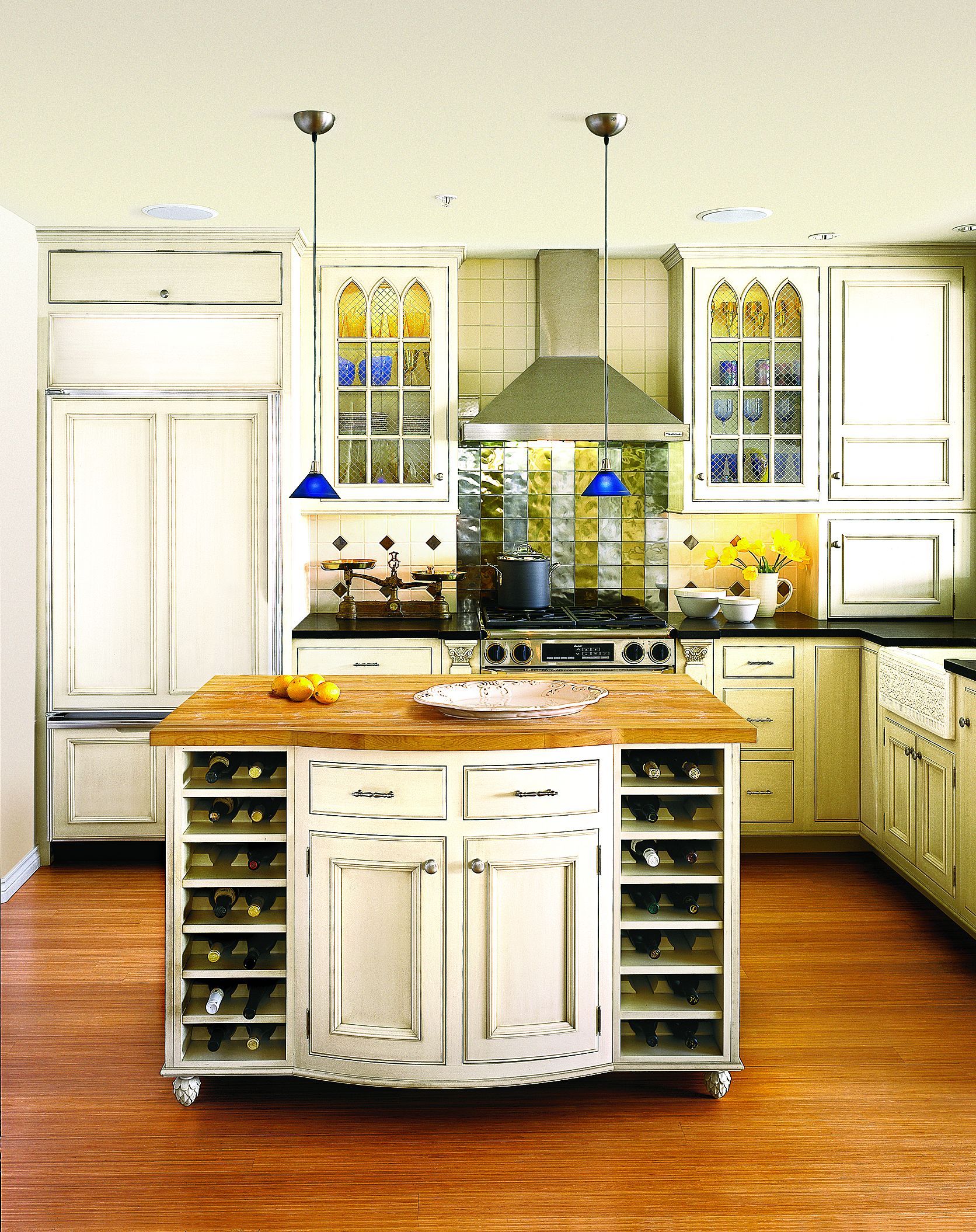 A kitchen island with built in wine storage.