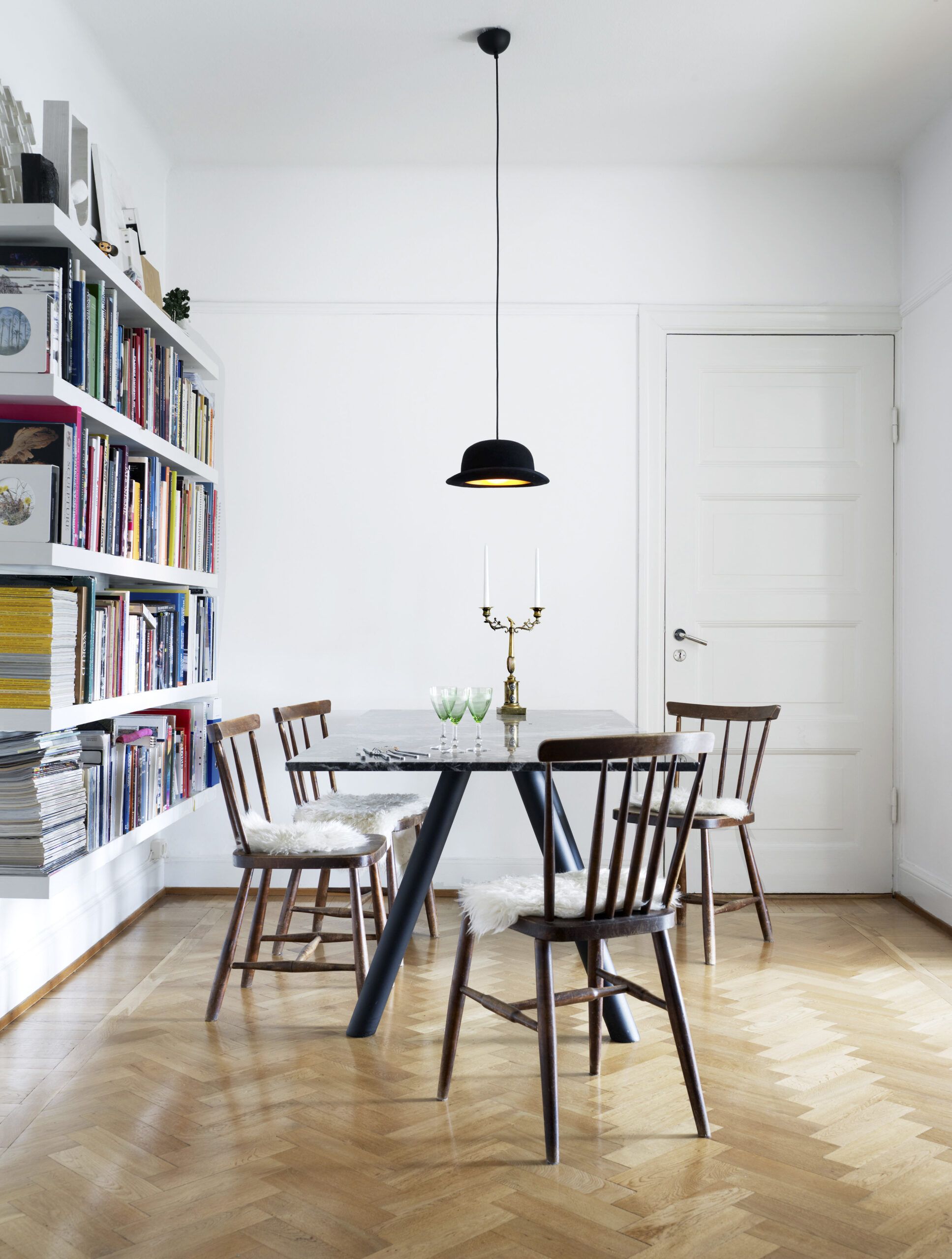 Prefinished wood floors in a herringbone pattern.