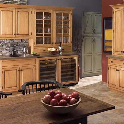 Cabinets that extend down to counter tops so they can be reached more safely.