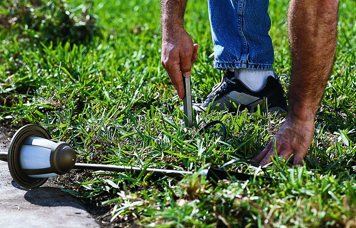 a man Prepare Holes for the Lighting Fixtures