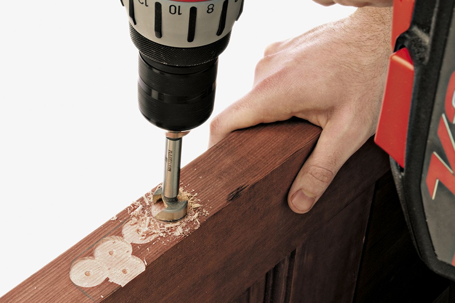 drilling a mortise into a door