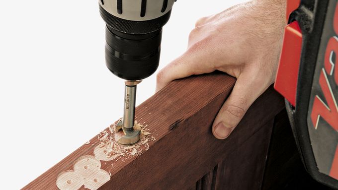 drilling a mortise into a door