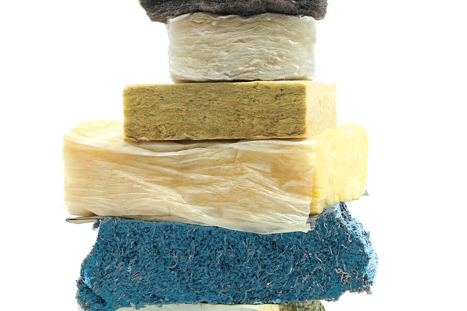 7 Insulation materials stacked on top of each other into a tower.