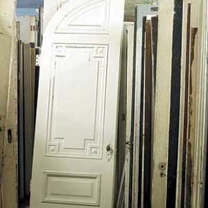 Several old arched top Italianate doors.