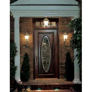 A well lit front door of a home.