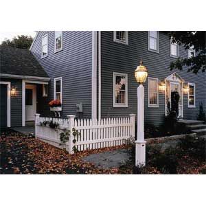 A home with lighting around the front door.