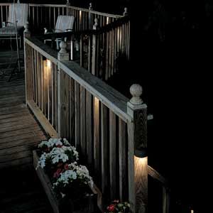 Lighting around the patio of a home.