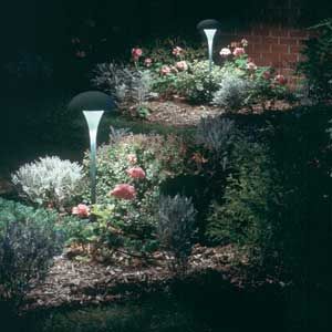 Outdoor lighting by a garden. 