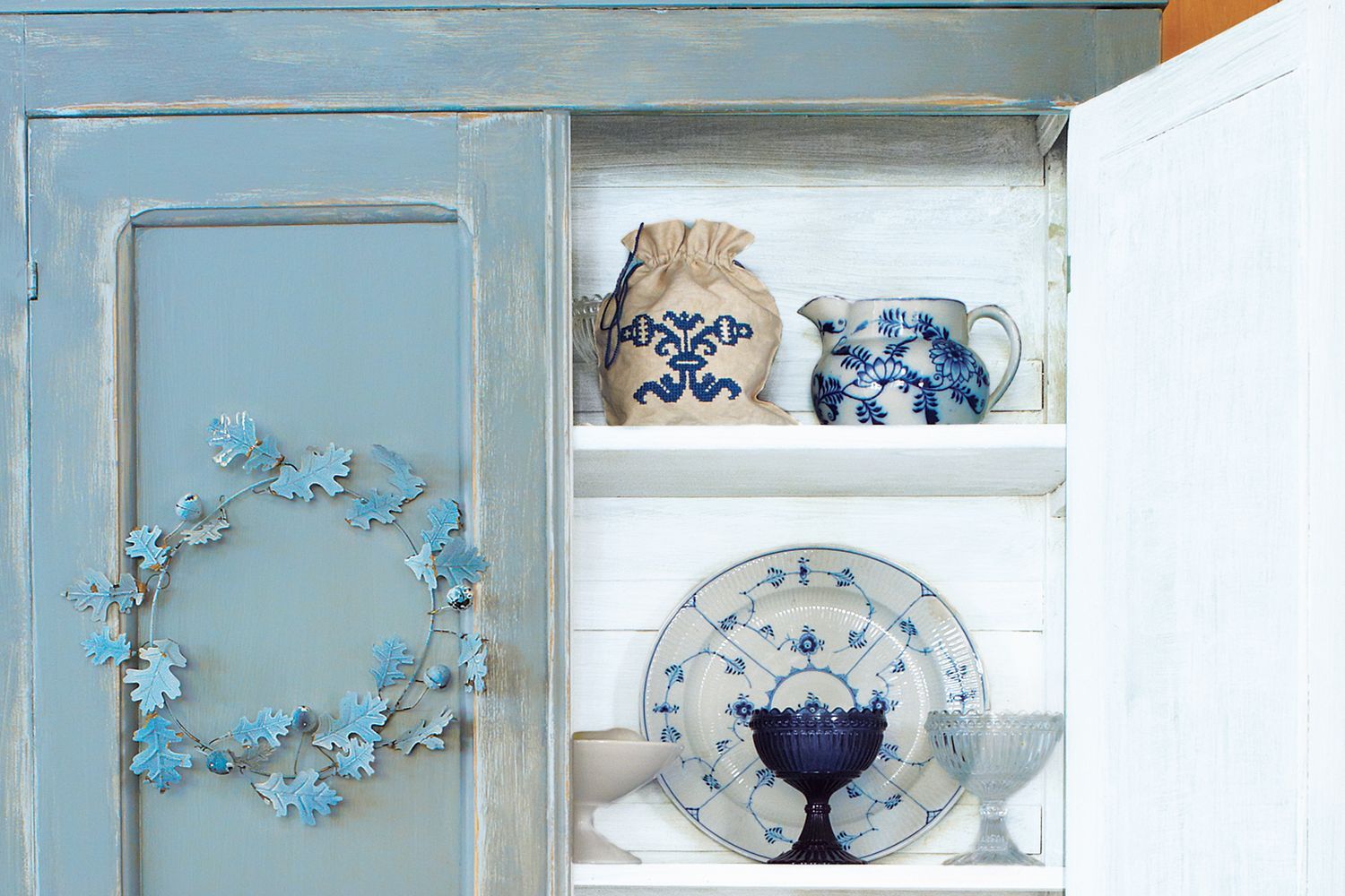 A cabinet that has been faux-aged.