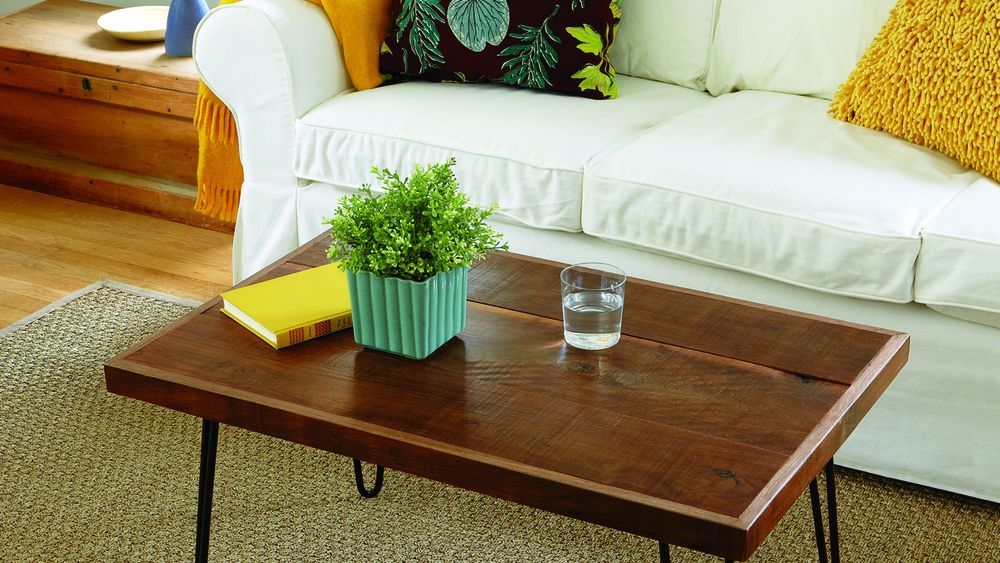 A living room with a hairpin-leg coffee table.