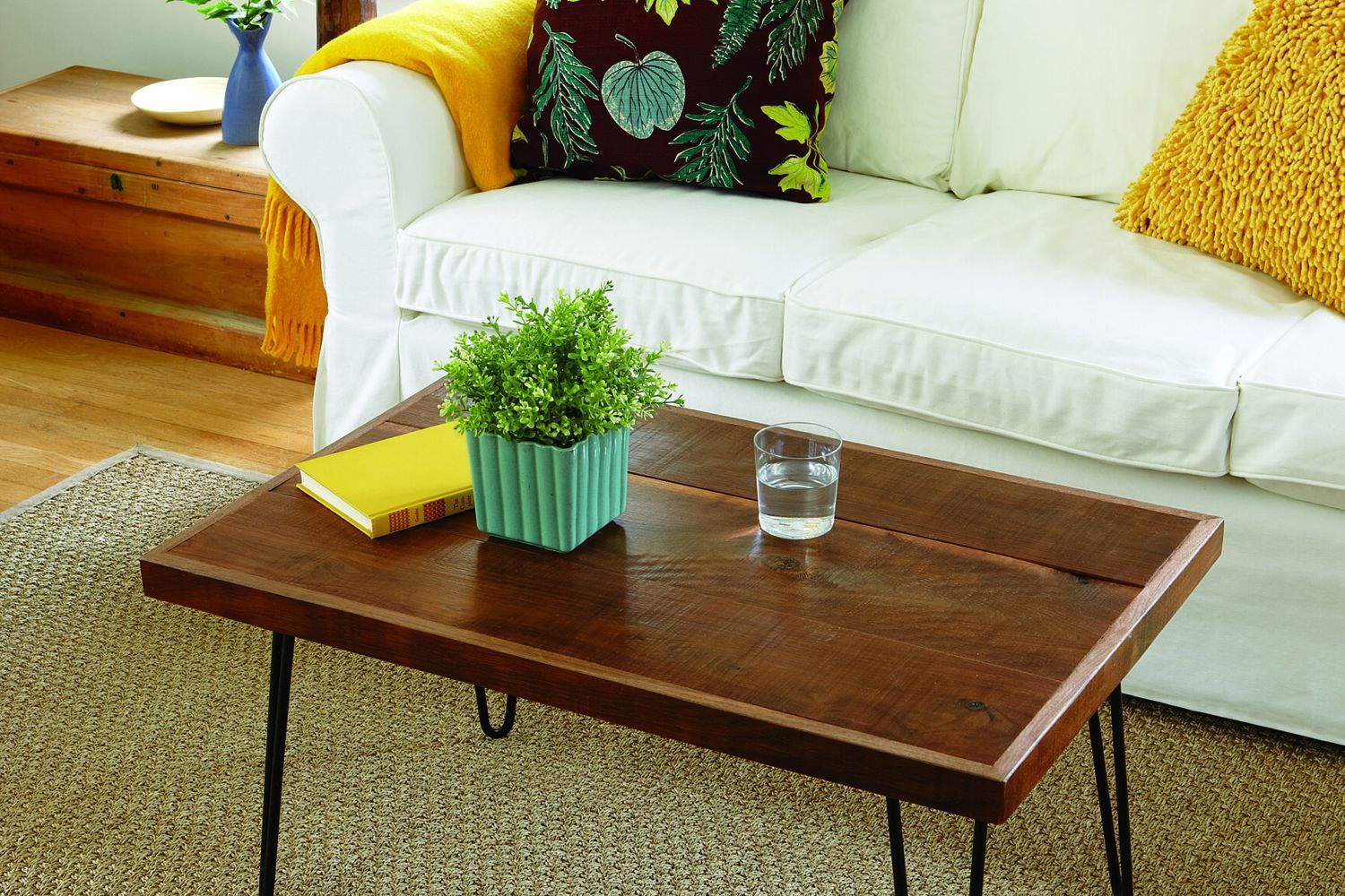 A living room with a hairpin-leg coffee table.