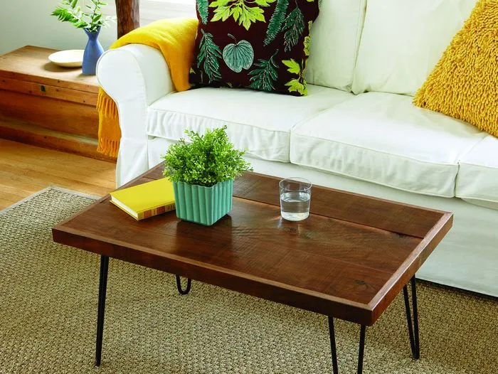A living room with a hairpin-leg coffee table.