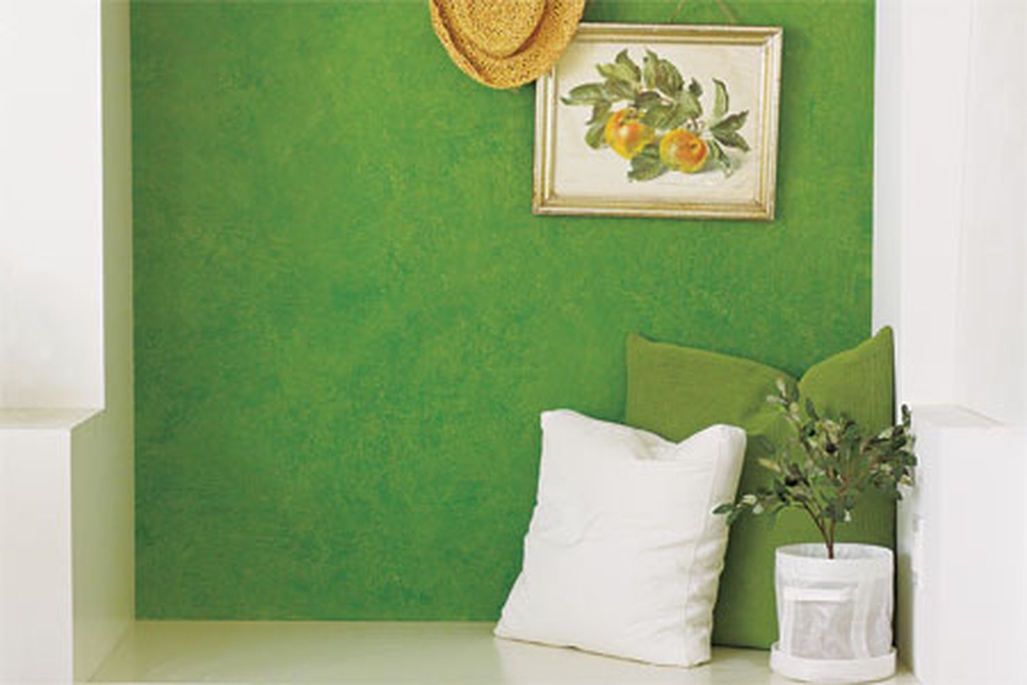 Green wall with an old world look, created by using a rag rolling technique.
