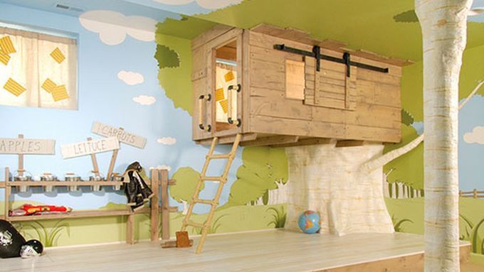 A kids playroom with a tree house