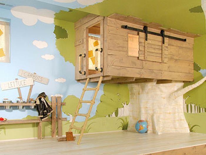A kids playroom with a tree house